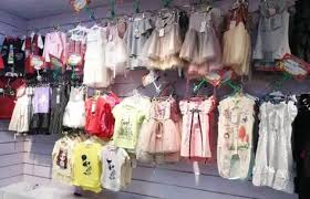 تجار ملابس الاطفال بالجملة